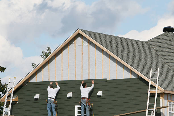 Professional Emergency Siding Repair technician working in Sharon Center, OH